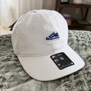 Nike White Hat with Blue Emblem